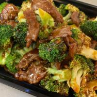 Beef With Broccoli · Served with white rice.