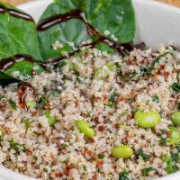 Quinoa Bowl · Organic white and red Quinoa, green garbanzo beans, kale, shelled edamame (soy beans) on a b...