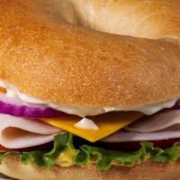 Turkey & Cheddar Deli Sandwich · Roasted turkey goes from simple to satisfying with tangy cheddar cheese, crispy lettuce and ...