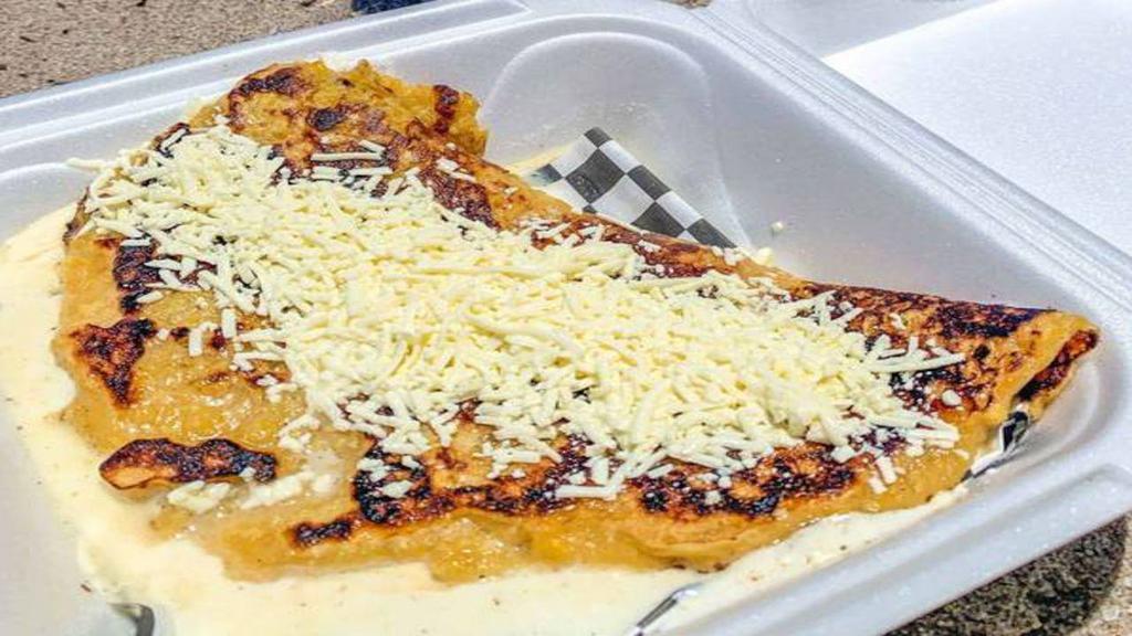 Cachapa With Chicken  & Llanero Cheese · Pollo & Queso Llanero