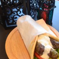 Kufta Kabab Wrap · Charbroiled ground sirloin beef, seasoned with a special blend of herbs and spices. Served o...