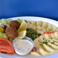 Vegetarian Mezza Platter · Combination of hummus, baba ganouj, tabbouleh and Greek salad with 2 crispy falafel. Served ...