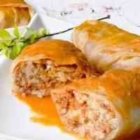 Golubtzi · OUR SPECIAL
Cabbage leaves stuffed with ground beef, rice and vegetables. First fried in a p...