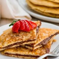 Crepes With Nutella · Very thin pancakes with nutella