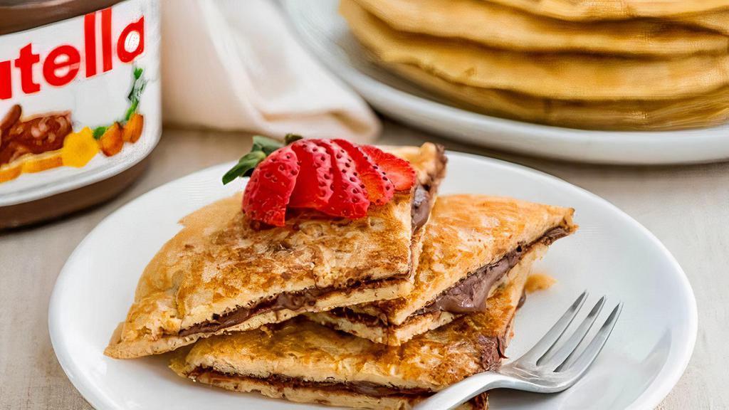 Crepes With Nutella · Very thin pancakes with nutella