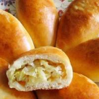 Pirozhok With Cabbage · Russian yeast-leavened boat-shaped buns with a variety of fillings
1 pc