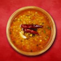 Yellow Youth Lentil (16 Oz.) · Fried Yellow dal garnished with garlic, dry red chili, and cumin seeds.