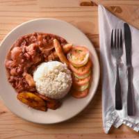 Stew Peas · Red kidney beans stewed with pigtail and fresh cuts of oxtail complimented with island spices.