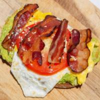 Avocado Toast · Multi grain toast covered in freshly mashed avocado. Homemade spread. 1 fried egg, tomato an...