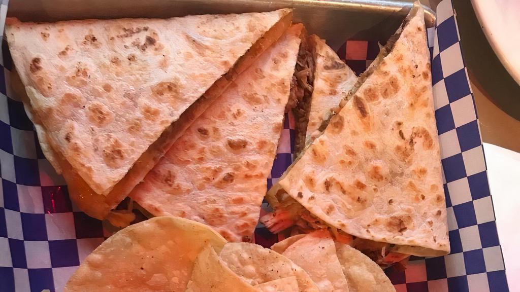 The Perfect Quesadilla · Flour tortilla grilled and filled with cheese. Served with tortilla chips and salsa.