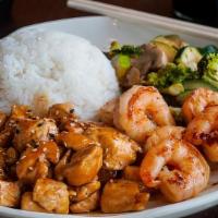 Hibachi Chicken & Shrimp · Broccoli, mushroom, zucchini, teriyaki chicken, hibachi shrimp and rice. Comes with a side o...