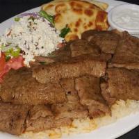 Lamb Gyro Platter · Thinly sliced spit roasted traditional gyro.