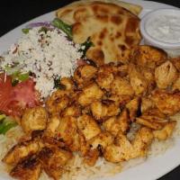 Chicken Gyro Platter · Thinly sliced, spit roasted marinated chicken. All entrees are served with rice, greek salad...