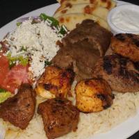 Agora Mixed Grill · Mixed grill consists of chicken and lamb sis kebab, adana kebab, kofta kebab, and beef or la...