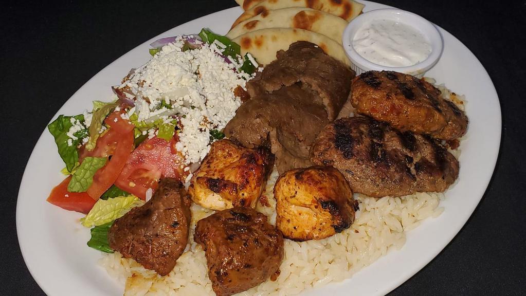 Agora Mixed Grill · Mixed grill consists of chicken and lamb sis kebab, adana kebab, kofta kebab, and beef or lamb gyros.