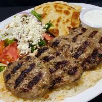 Kofte Kebab · Grilled seasoned ground beef with Turkish spices and herbs.