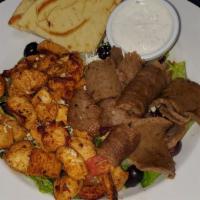 Mixed Salad · Greek Salad with lamb and chicken gyro meat on top.