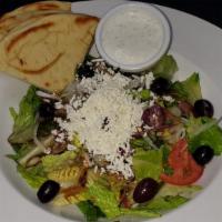 Greek Salad · Romaine, cucumbers, tomatoes, mixed peppers, sweet red onions, black olives, feta cheese, an...