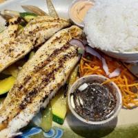 Grilled Tilapia · Marinated and grilled over high heat to temperature, served with sautéed vegetables w/ aioli...