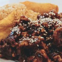 Sesame Beef · Hot and spicy. Sliced beef lightly deep fried, sauteed with house special hot sauce and sesa...