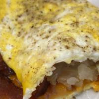 Omelet · 2 eggs, Cheese, Bacon or Sausage, Toast
