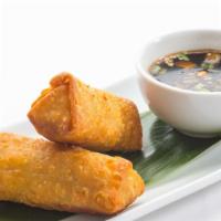 Egg Rolls · Hand-rolled with marinated pork and vegetables.