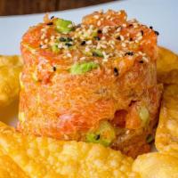 *Salmon Tartare · Chopped Salmon with sesame oil, avocado, spicy mayo and sesame seeds.