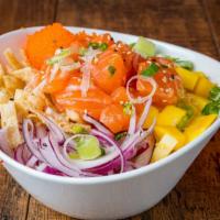 *Citrus Salmon · Salmon poke with mojito lime sauce, cucumber, mango, red onions, wonton chips, scallions, ma...