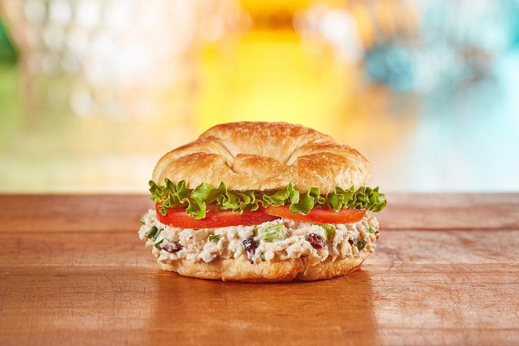 Chicken Salad Sandwich · Freshly made Chicken Salad with lettuce and tomato on a flaky croissant
