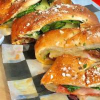 Vegetarian Stromboli · Green peppers, onion, mushrooms and spinach.