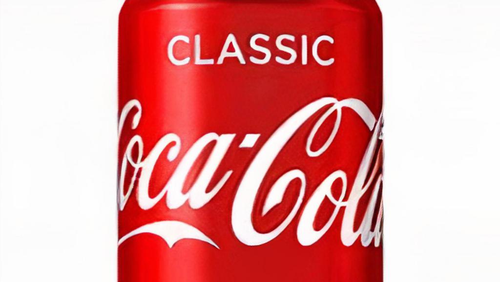 Coca Cola (12 Oz) · Twelve ounce can.