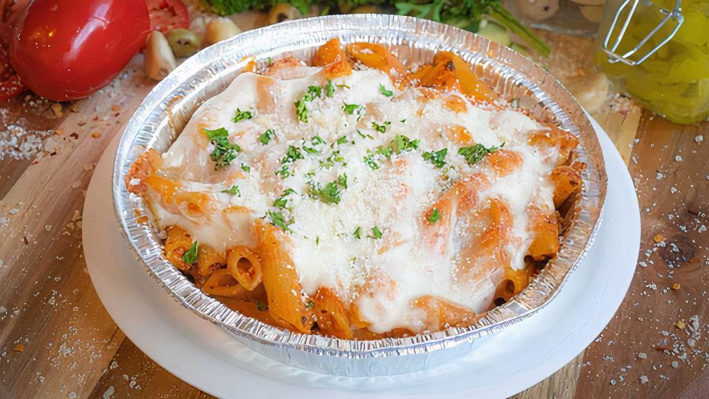 Baked Ziti · Penne baked in Marinara sauce with ricotta, parmesan and melted mozzarella.