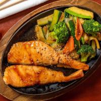 Salmon Teriyaki (Dinner) · Salmon steak teriyaki, pan fried vegetables, and steam or fried rice. Served with soup and s...