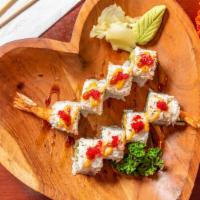 Red Velvet Roll · Tempura shrimp, cucumber, avocado topped with baked crab meat, red tobiko, spicy mayonnaise,...
