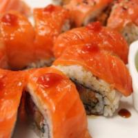 Wasabi Maki Roll · Tuna, yellowtail, crab stick and cucumber topped with salmon served with wasabi sauce.