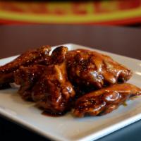 Bbq Wings · Our hot wings are cooked crispy and deep fried. Choose your flavor sauce:  Mild, Hot, BBQ, L...