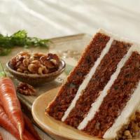 Carrot Slices · This moist carrot cake is topped with cream cheese walnut frosting.