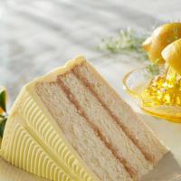 Lemon Slice · In between each lemon layer is mouth-watering lemon curd filling and topped with a lemon cre...