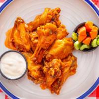 Ted'S Pickled Hot Wings (8) · 8 pickled wings with your choice of spicy sweet chili, buffalo or bbq sauce, served with blu...
