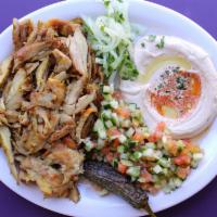 Shawarma Plate  · Shawarma on a plate served with your choice of salads and a pita. Comes with one side.
