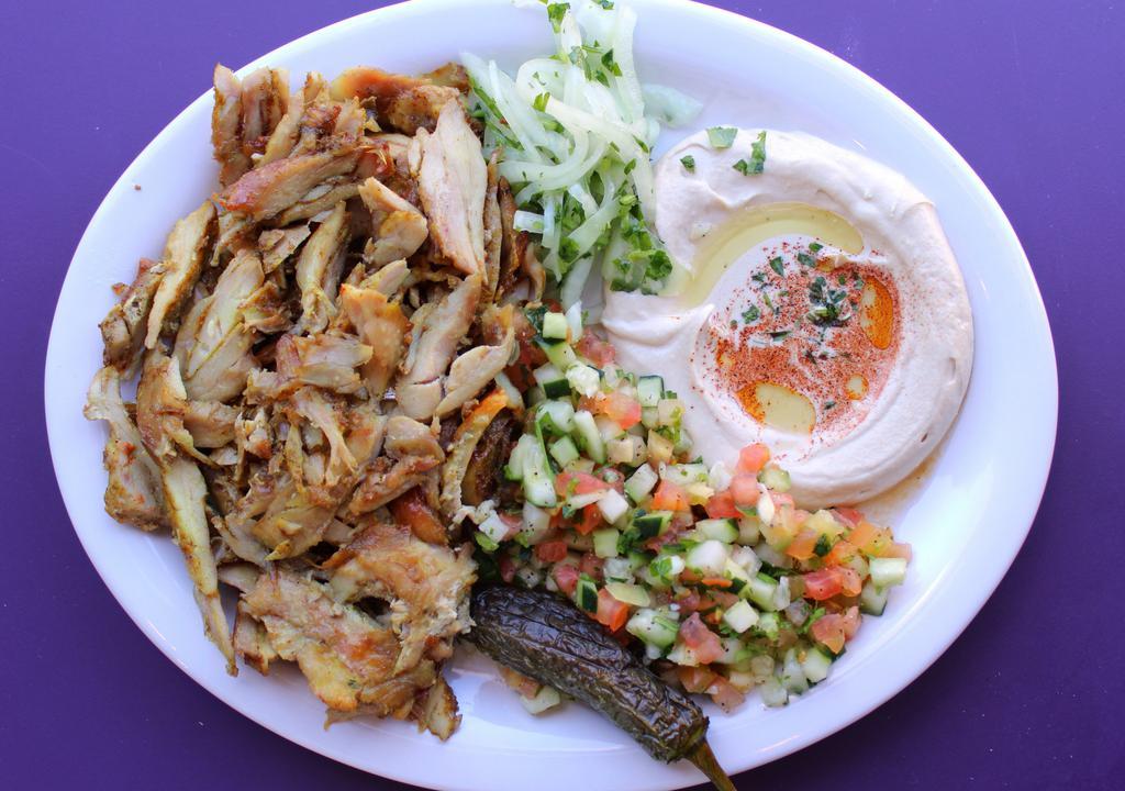Shawarma Plate  · Shawarma on a plate served with your choice of salads and a pita. Comes with one side.