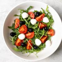 Mediterranean Salad · Yummy garden salad with salami, mozzarella, artichoke hearts, gorgonzola cheese, and choice ...