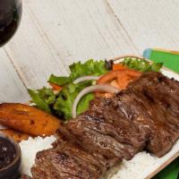 Churrasco Steak Entree · A Latin American classic! A tender, 10 oz. USDA Choice churrasco steak is served with a live...