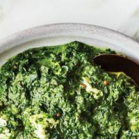 Saag Paneer · Chopped spinach prepared in a delight light cream sauce with cubed paneer.