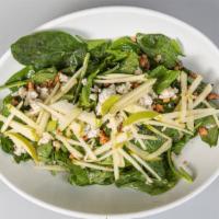 Bocas Grill Salad · Homemade dressing, spinach, blue cheese, caramelized walnuts, and green apple.