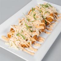 Special Fried Green Plantain · Special Fried Green Plantains with Shredded White Cheese and Pink Sauce