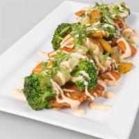 Fried Green Plantains With Vegetables · Fried Green Plantains covered with Smoked Vegetables & Pink Sauce