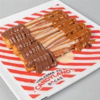 Traditional Churros · Churros with Condensed Milk, Nutella, and Dulce de Leche.