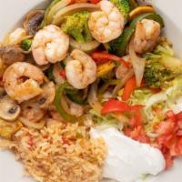 Camarones Con Arroz · Grilled shrimp cooked with broccoli, mushrooms, bell peppers, squash, zucchini, and onions. ...