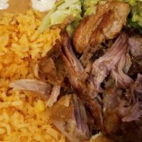 Carnitas Dinner · Tender fried pork with grilled onions. Served with rice, beans, salad, and tortillas.
